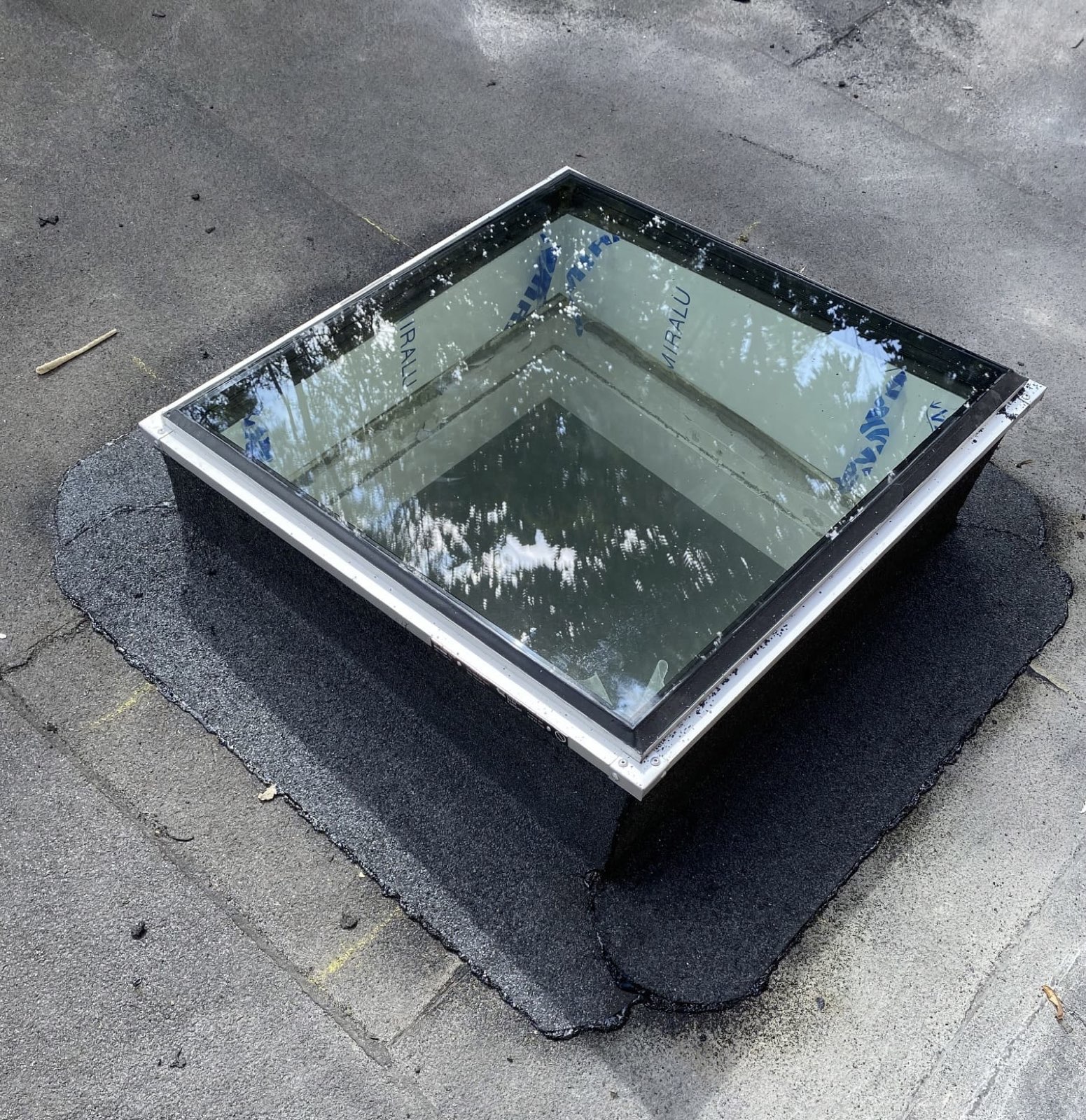 Lichtkoepel in plat dak